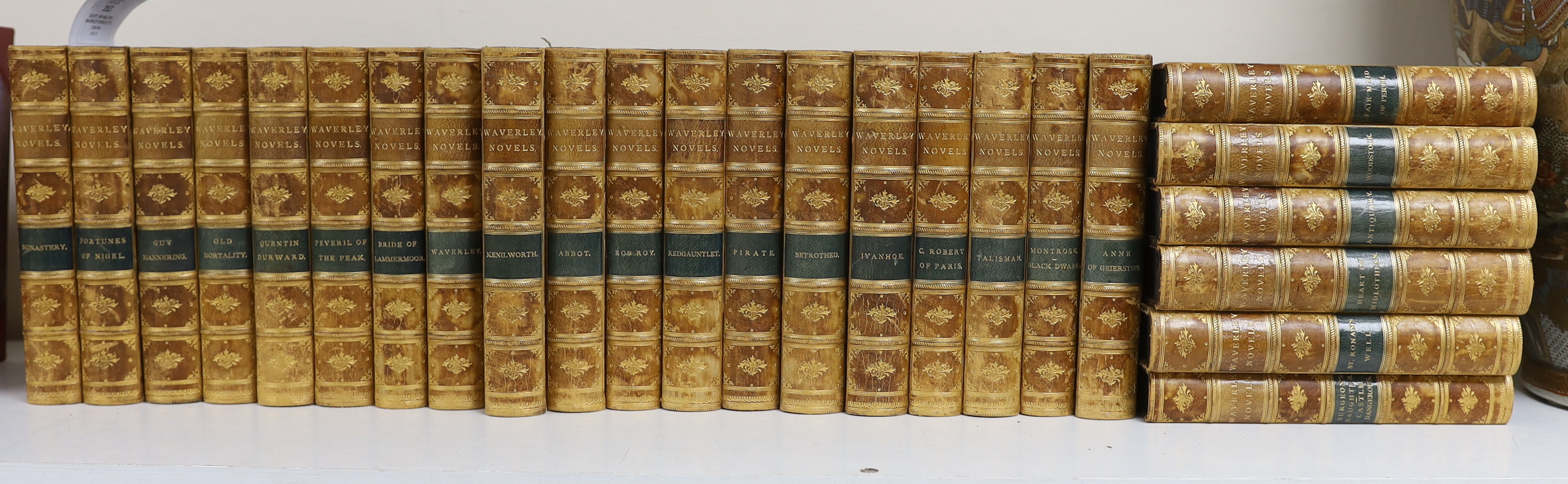 Scott, Sir Walter - Waverley Novels; the Centenary Edition, 25 vols. pictorial engraved titles, num. plates and some other illus.; contemp. half calf and marbled boards, gilt decorated panelled spines with green and tan